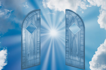 Sun rays shining on sky through open door. Religious concept