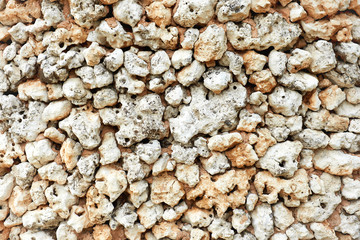 Old yellow stone background wall from ancient bricks. Texture for background