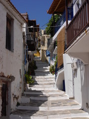 Fototapeta na wymiar Walk through the streets of the old town of Skopelos, Greece