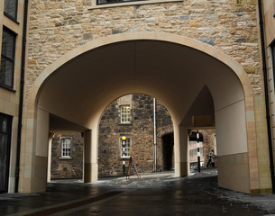 Archway under a refurbished old building