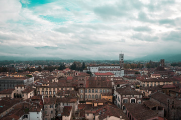 Skyline high up view of the quiet Tuscantown of Lucca, Italy