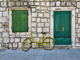 Fototapeta na wymiar Bike outside a Building in Stari Grad on the Island Hvar in Croatia