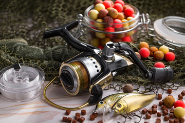 Spinning and fishing rods on an old background