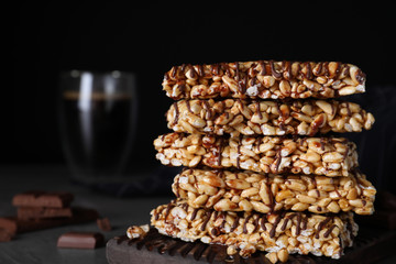 Delicious rice crispy treats on black background