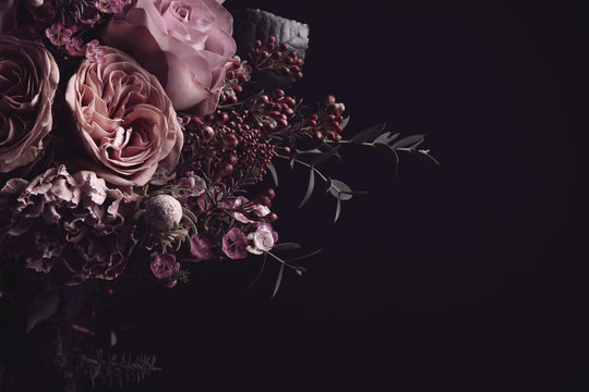 Beautiful bouquet on black background, space for text. Floral card design with dark vintage effect © New Africa