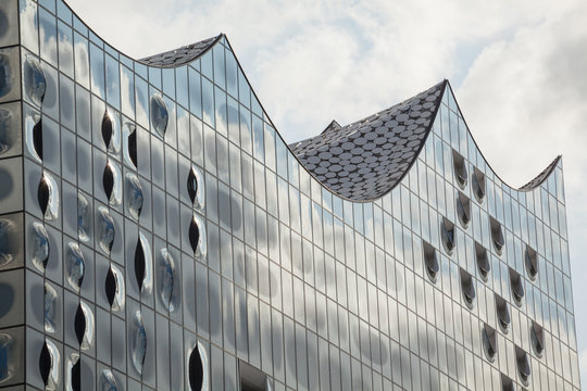 Hamburg, Germany - July 21, 2019: Glass facade of the Elbphilharmonie in Hamburg.