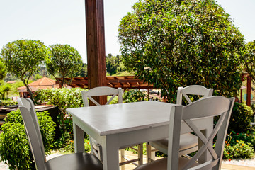 Desk of free space and spring blurred garden 