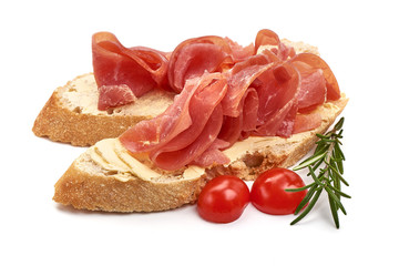 Italian prosciutto crudo sandwich. Dried ham, isolated on white background