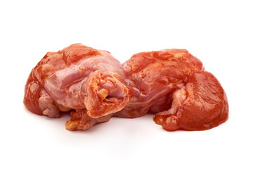 Raw chicken legs in a barbecue marinade, isolated on white background