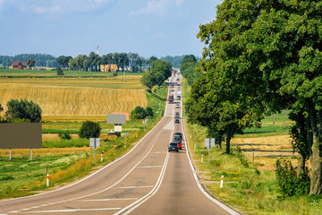 Scenery with car traffic on the road of Poland