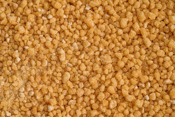 Soya Lecithin Granules background texture, macro photo. Vitamin and dietary supplements. Healthy nutrition concept.