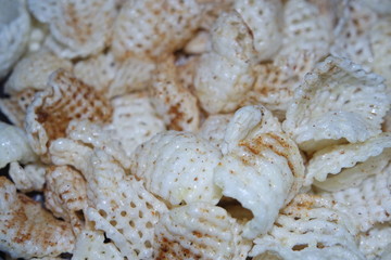 Closeup view of freshly fried chips as fast food usually eaten with tea.