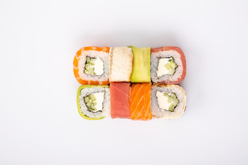  rainbow rolls top view on a white background for the menu