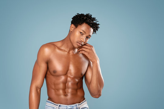 Fit african man with naked torso.