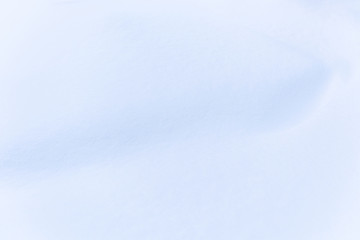 Background from snow. Snowdrifts on cold day. White fluffy snow. Frosty background. Snow white background.