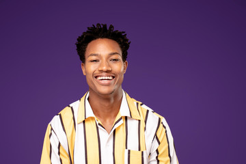 Happy african man smiling.