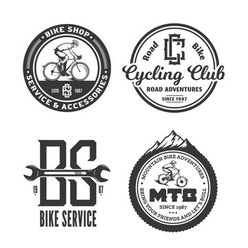 Set of vector black and white bike shop, bicycle service, mountain and road biking clubs and adventures badges
