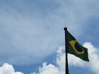 flag in the wind against blue sky brasil brazil