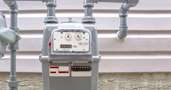 Timelapse of gas meter. Residential urban natural gas meter measuring gas consumption, outside house gas meter
