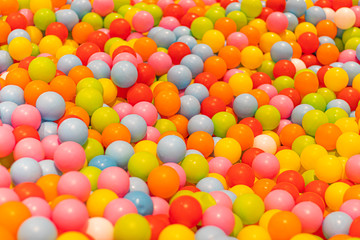 Colorful play balls pool in a kid playing area.