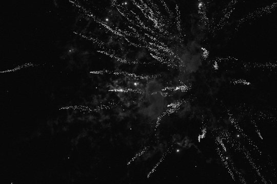 black and white firework exploding