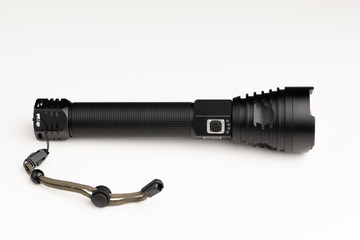 black pocket flashlight, white background