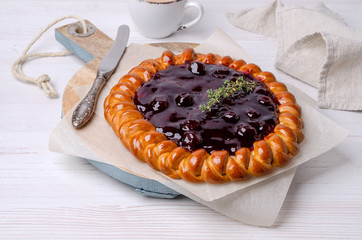 Open pie with berry jam