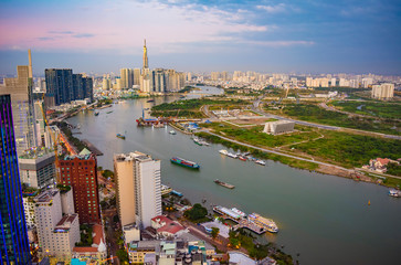 Ho Chi Minh City, Vietnam - CIRCA Jan 2020: Aerial cityscape of Binh Thanh District (far background), District 1 (left), and District 2 (right) at Ho Chi Minh City, Vietnam.