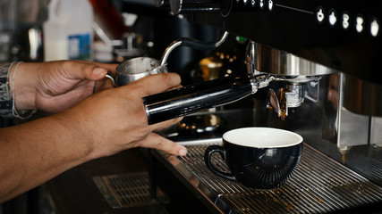 barista making coffee