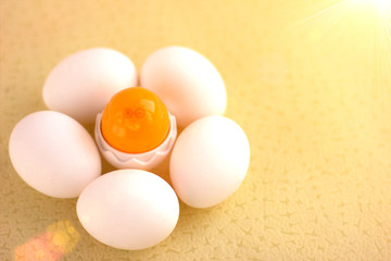 Toy Easter chicken, newborn in shell. for celebration design. Festive yellow chicken. Decorative easter eggs. Happy easter. Copy space for text. 