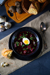 Delicious beetroot borscht with egg