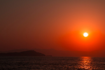Fototapeta na wymiar Red sunset on the Mediterranean. Travel concept
