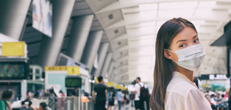 Woman Wearing Surgical Mask In Train Or Bus Station Walking Indoors. Prevention In Public Spaces.