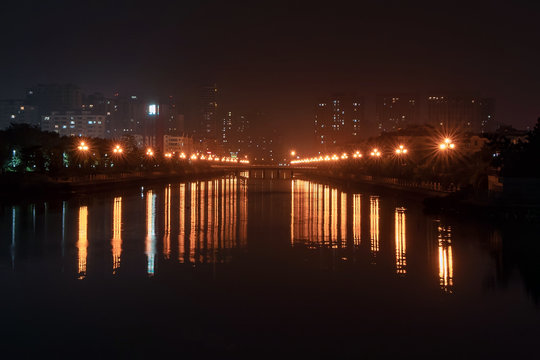 Night embankment. City quay landscape in Weihai.