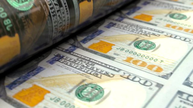 Extreme close up of US dollars press machine during printing 100 USD banknotes. Colorful animation showing how world famous USA currency is being made. Seamless loop.