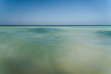 Ocean water on a beach in Cuba. 