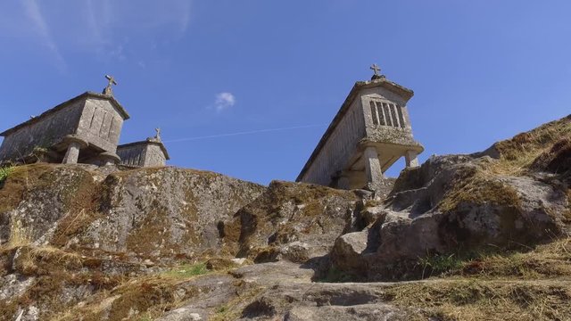 Typical corn stone driers granaries Espigueiros in Soajo village Portugal 4k