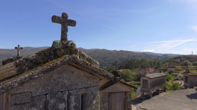 Typical corn stone driers granaries Espigueiros in Soajo village Portugal 4k
