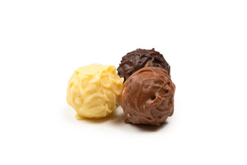 Chocolate truffle isolated on white background.
