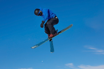 Skier jumps in Snow Park, big air