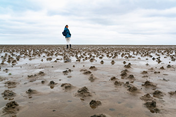 WALKING ON THE WADDEN SEA ON SYLT.