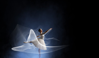 Ballet dancer in jump . Mixed media