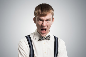 Obraz premium Frenzied hipster screaming with anger.