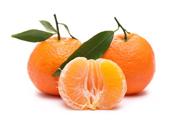 Mandarin and peeled pieces with leaf isolated on white background