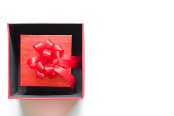 Top view red gift box with copy space in white background for special event, Valentine, Happy new year, Christmas
