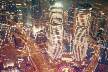 Financial chart on city scape with tall buildings background multi exposure. Analysis concept.