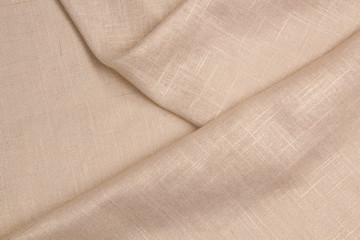 Fabric beige linen. Beige Textile Drapery