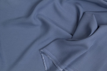 Fabric suit fold top view. Blue textile