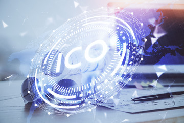 Double exposure of blockchain and crypto economy theme hologram and table with computer background....