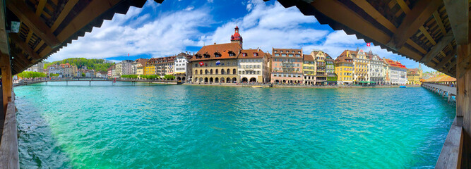 Panoramic View over Reuss River and Chapel Bridge in City of Lucerne in Switzerland.